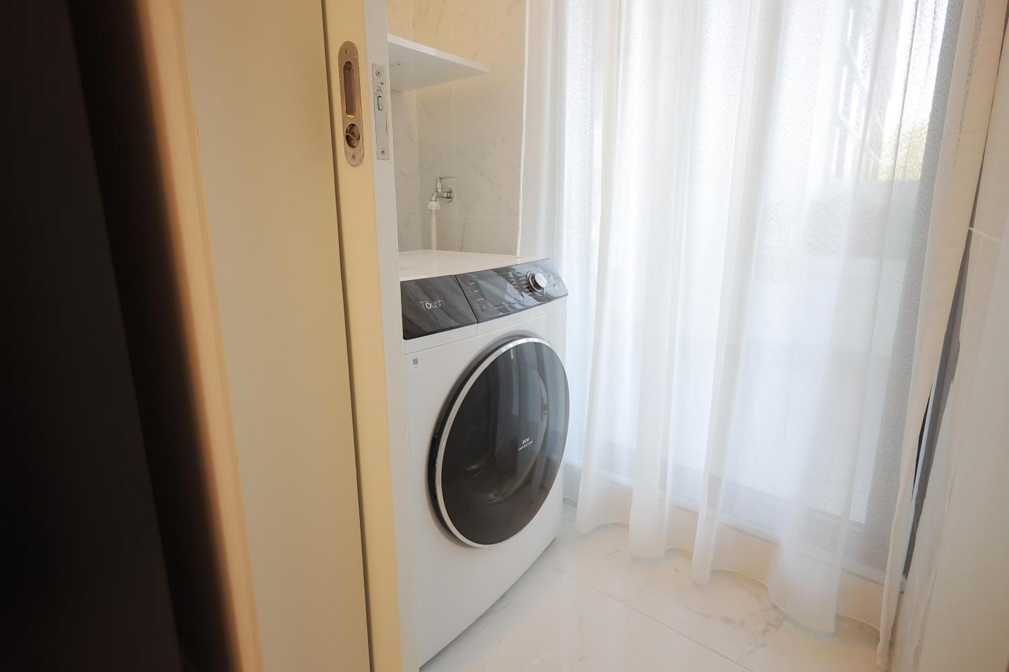 The Riyaz Lavanya Langkawi 판타이체낭 외부 사진 A washing machine